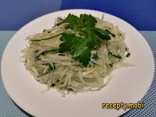 Fresh cabbage salad with cucumber