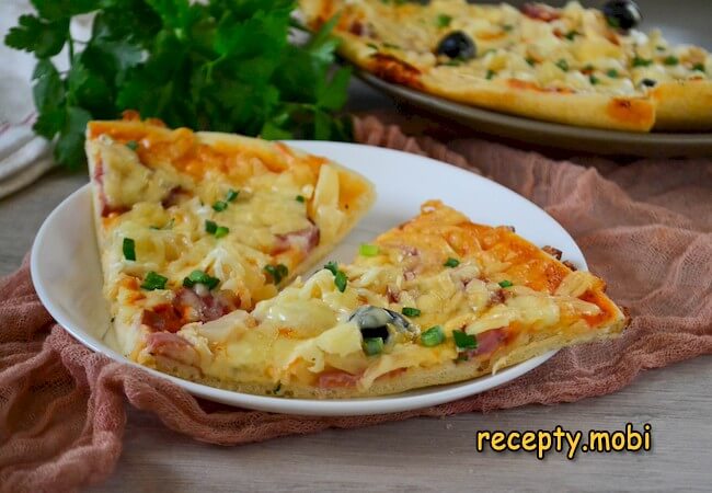 Pizza with pineapple and ham