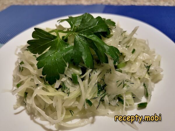 Fresh cabbage salad with cucumber