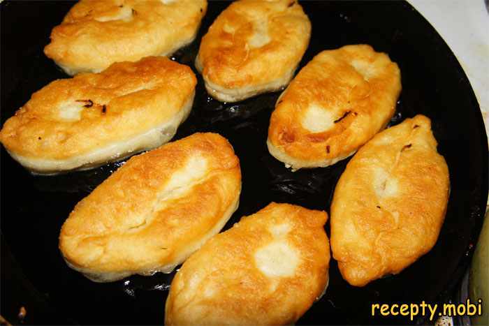 Lenten pies with cabbage fried in a pan
