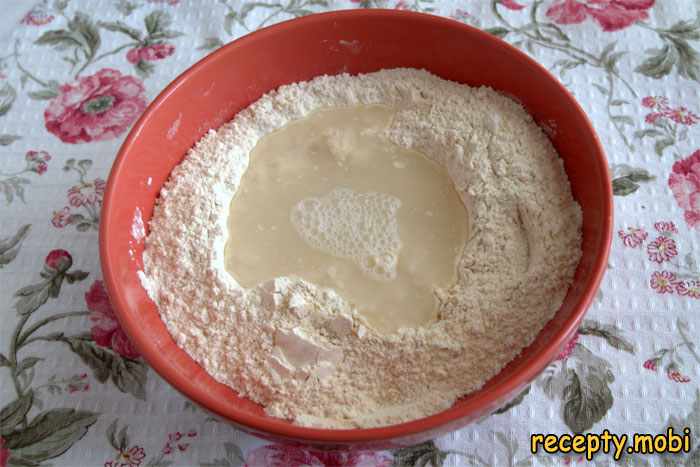 pour warm water into the flour - photo step 4