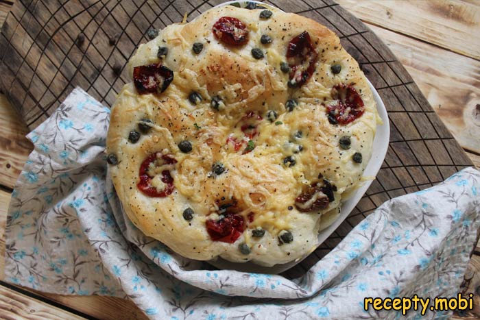 Focaccia with tomatoes and cheese