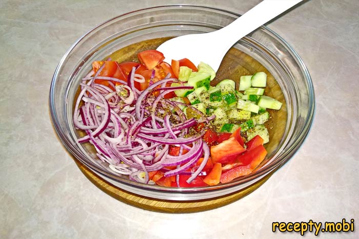 All vegetables, except olives and cheese, are transferred to a bowl - photo step 11