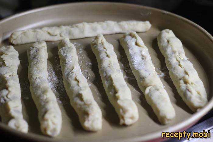 Put the finished tubes with cherries on a baking sheet - photo step 4