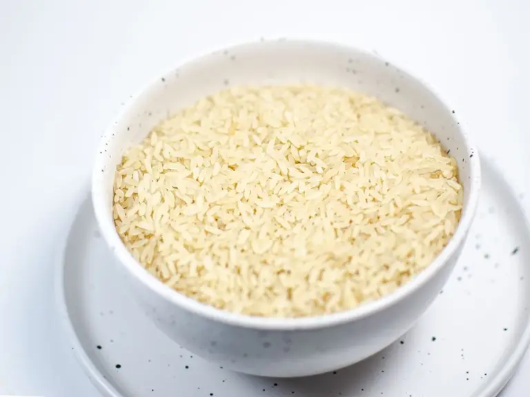 Dry long-grain rice in a bowl before rinsing