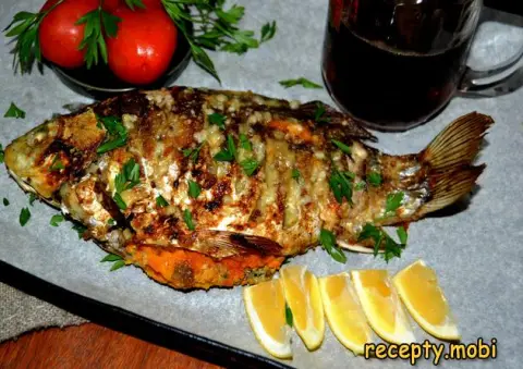 Stuffed vegetables crucian carp, baked whole in the oven