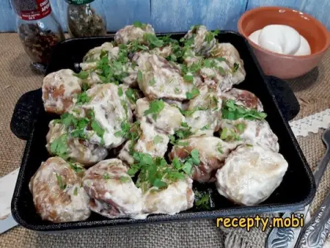 Fried Dumplings with Sour Cream in a Skillet