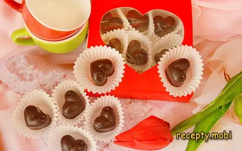 Candies with peanuts, dried apricots, and prunes at home