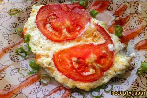 Chicken fillet baked with cheese and tomato